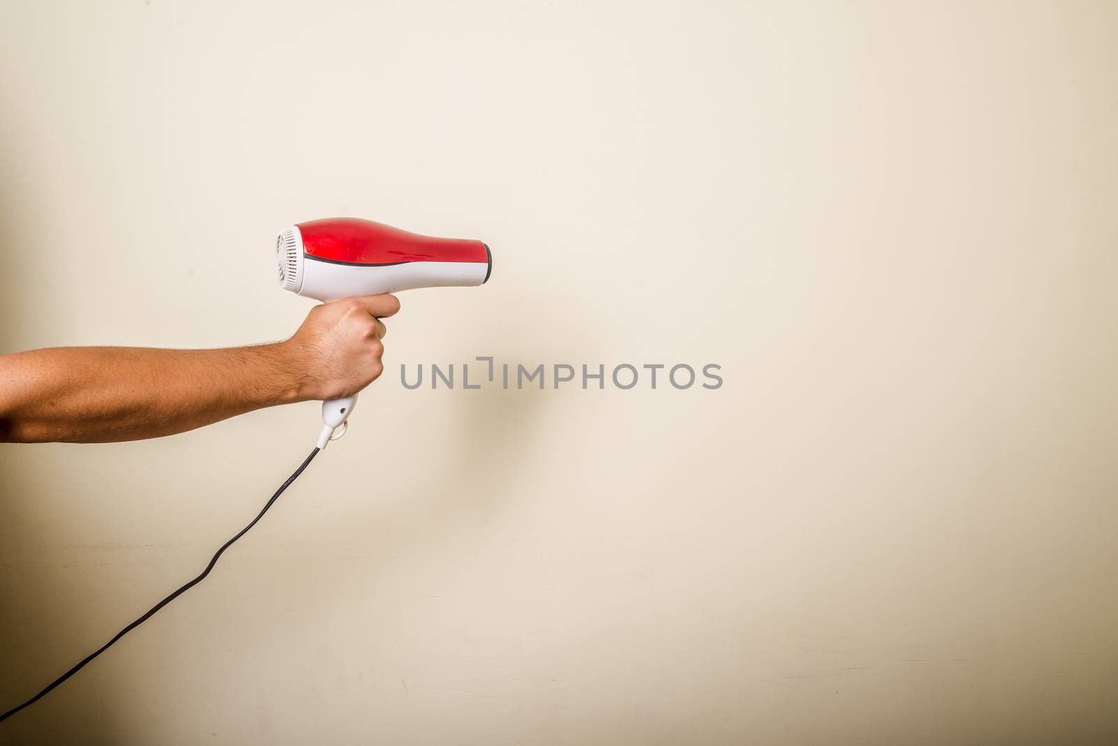 crazy funny young man with blue wig on white background