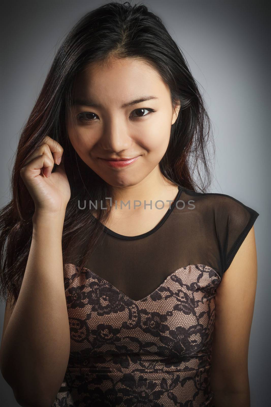 Attractive asian girl 20 years old shot in studio by shipfactory