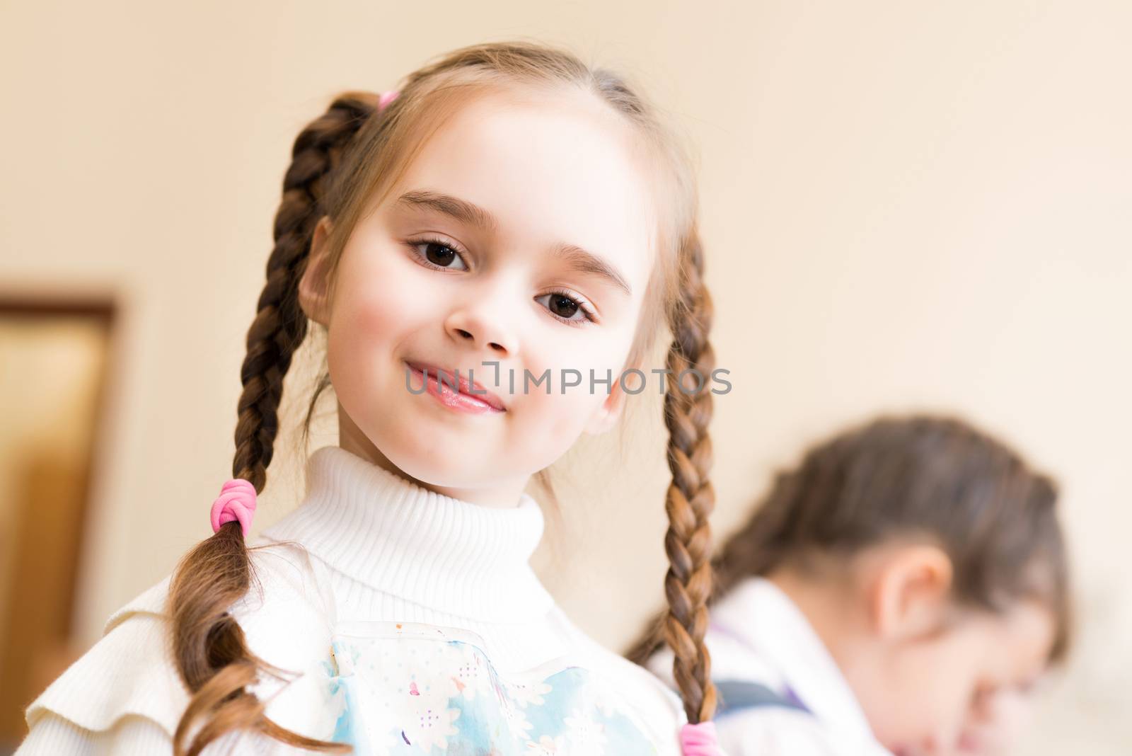 portrait of a girl in an apron, the kids involved in art school