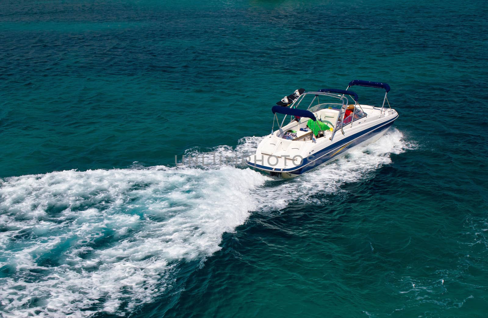 Powerboat on blue open sea water