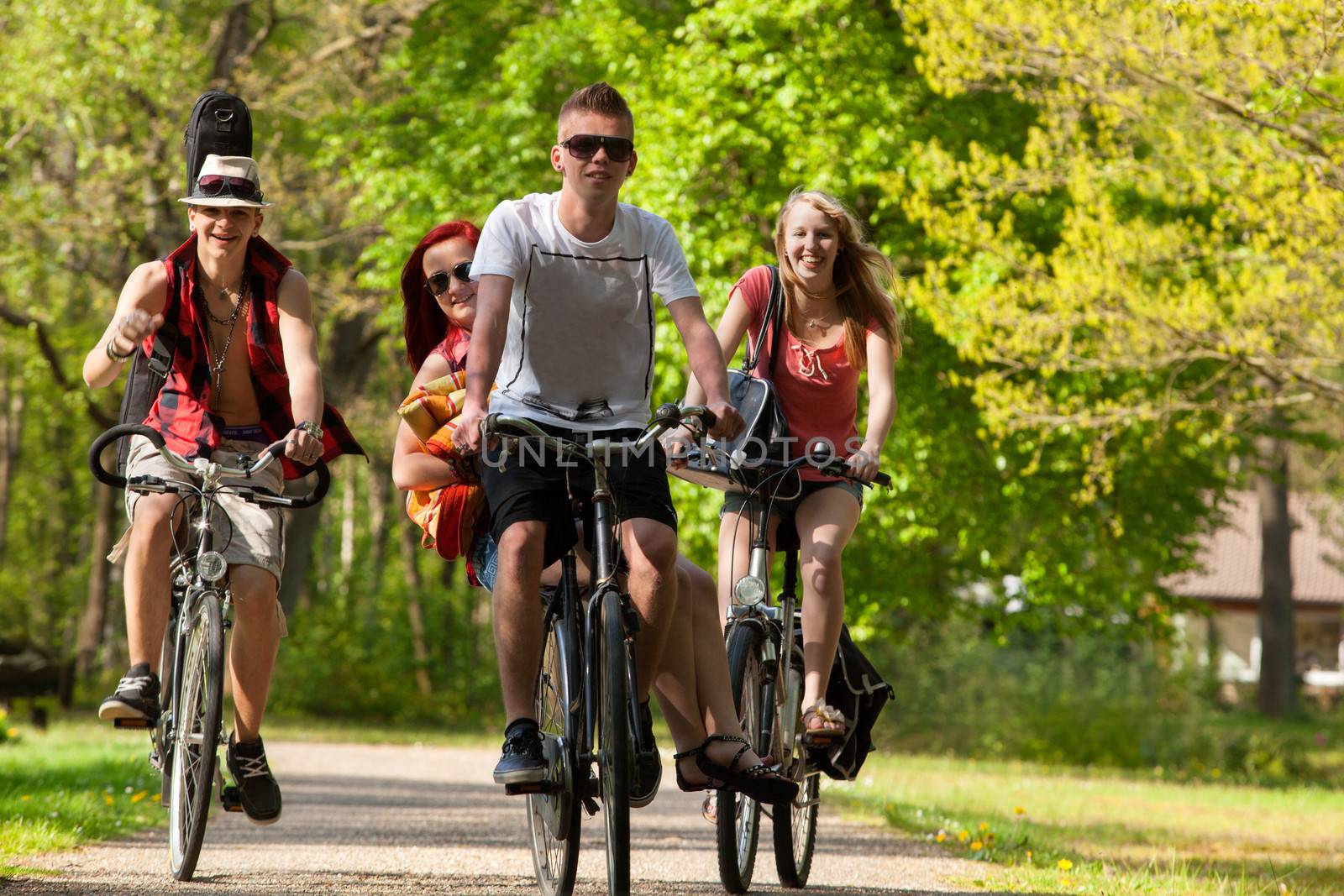 Young teenagers are making a trip with the bicycles