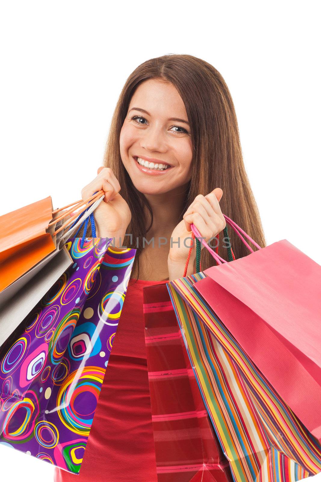 Beautiful woman with shopping bags, isolated on white