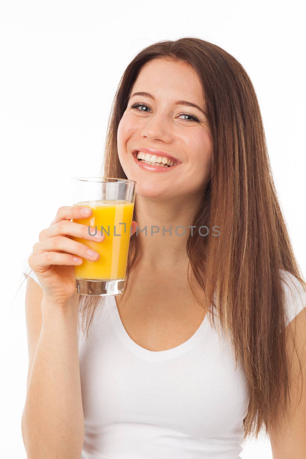 Pretty young woman with a glass of orange juice, isolated on white