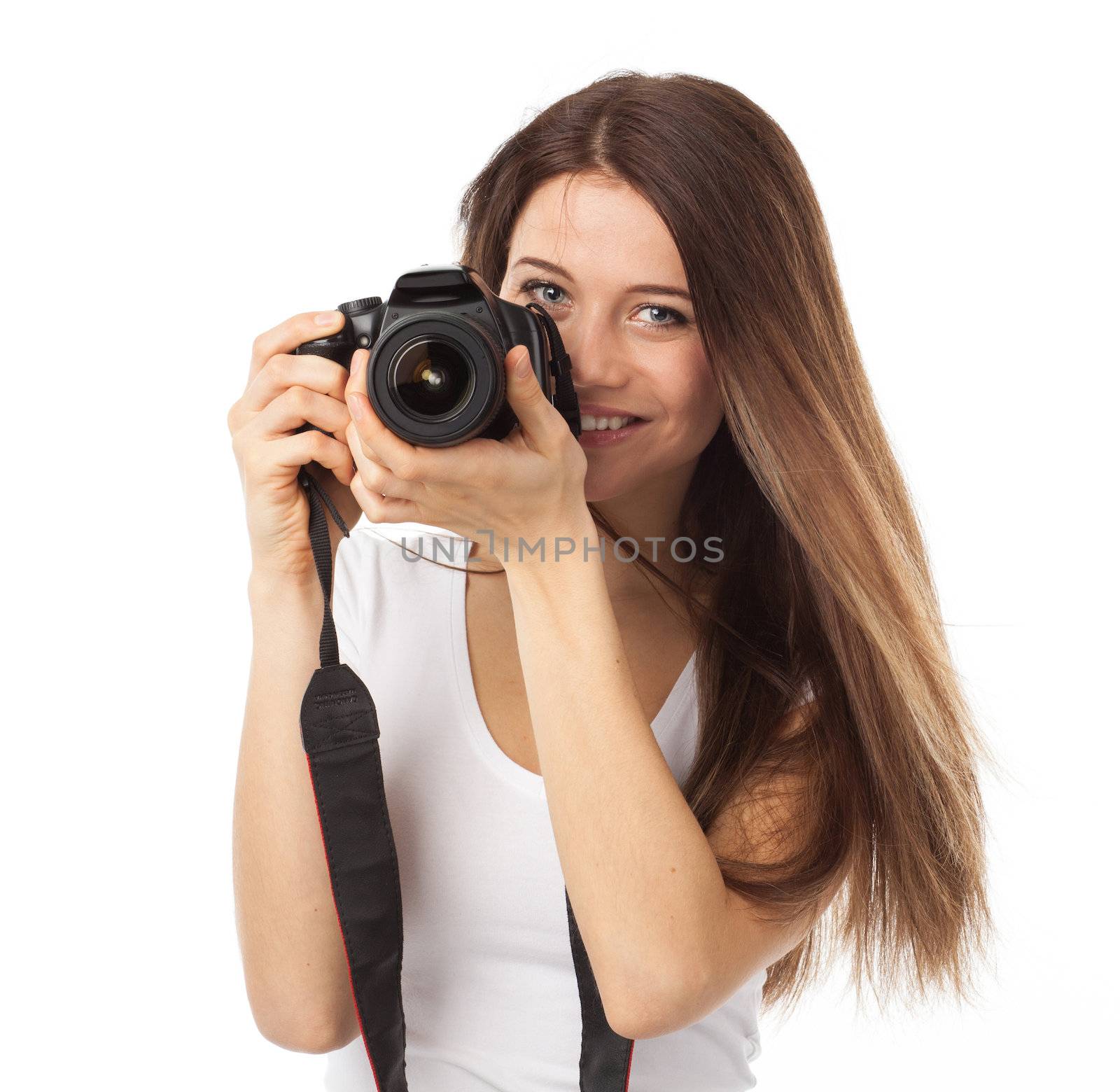 Cute smile and digital camera
Young woman with camera and smiling, isolated on white