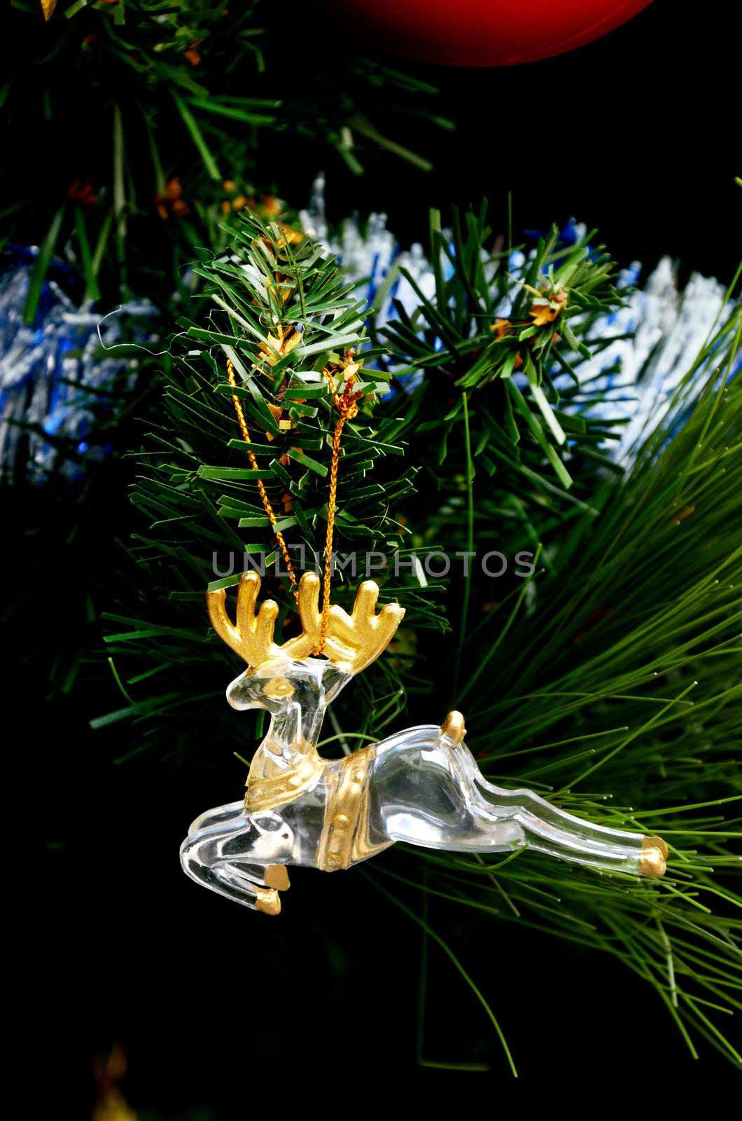 Reindeer antlers toy hanging on christmas tree, Christmas concept