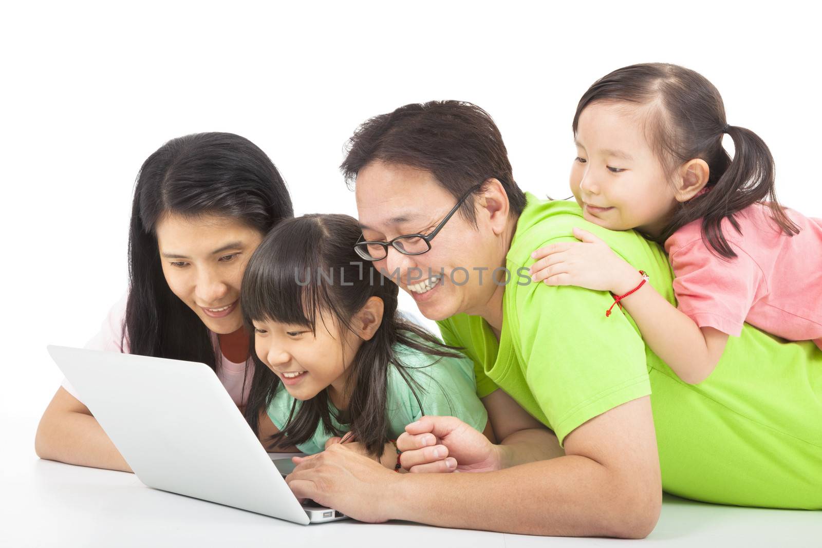 happy family with computer by tomwang