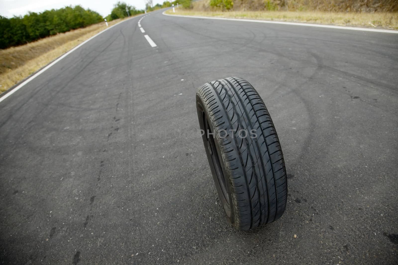 Wheel of a car on a road