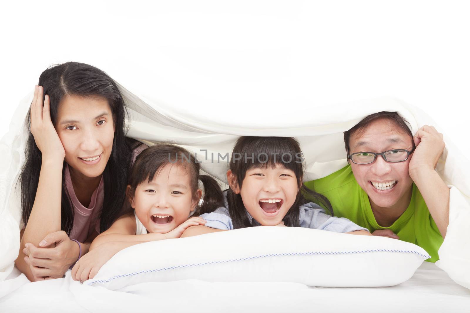 Happy family on the bed by tomwang
