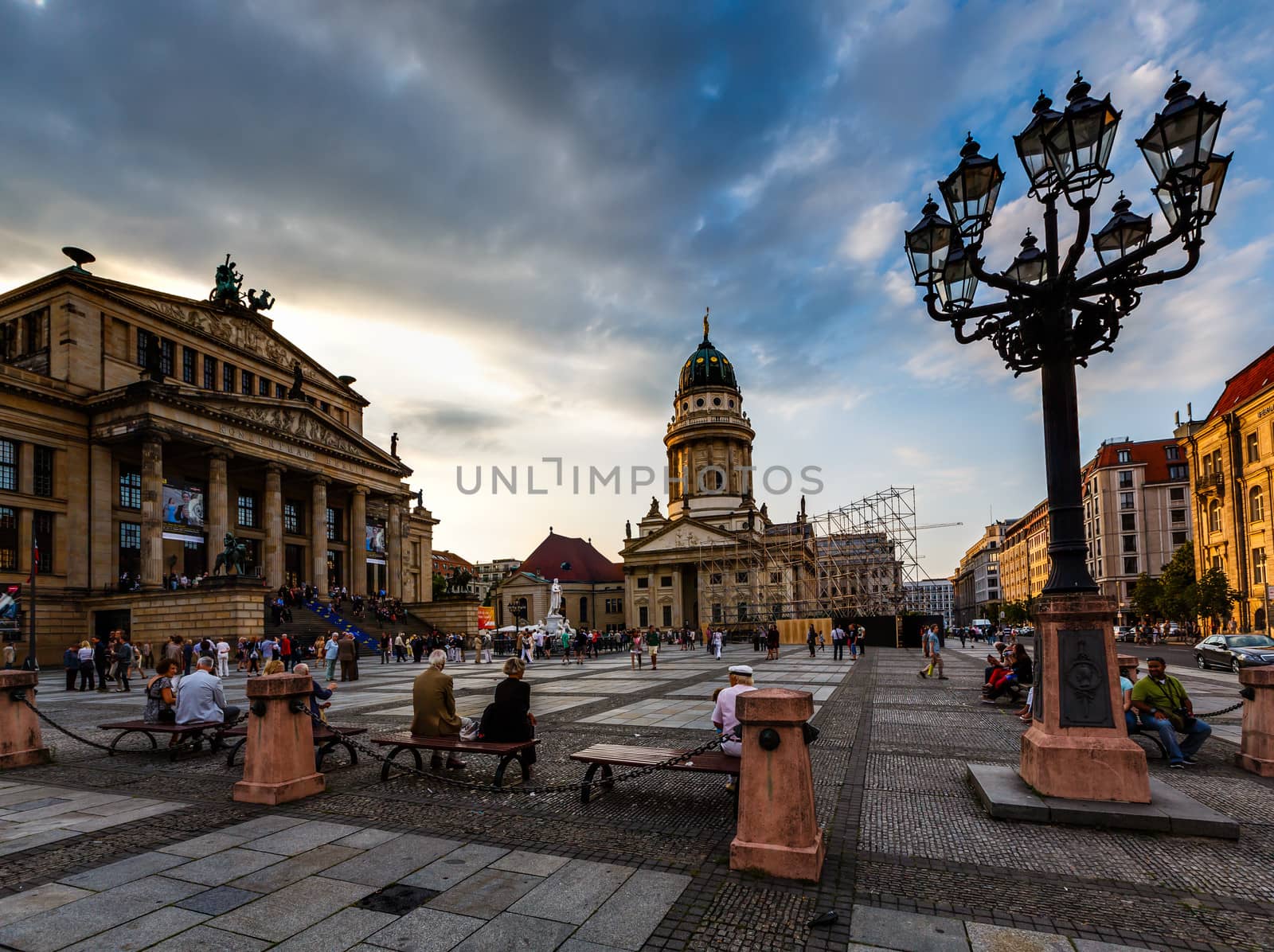 BERLIN, GERMANY - AUGUST 10: French Cathedral and Gendarmenmarkt Square on August 10, 2013 in Berlin, Germany. The square was created by Johann Arnold Nering at the end of the seventeenth century.