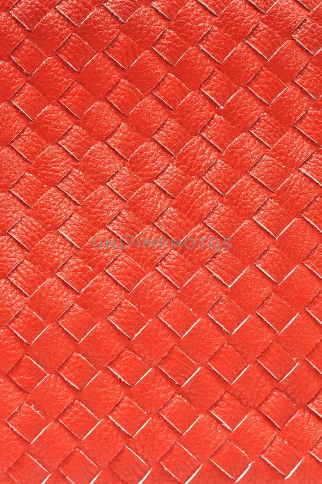 Close up of Red leather weaving for use as Background or Texture by thampapon
