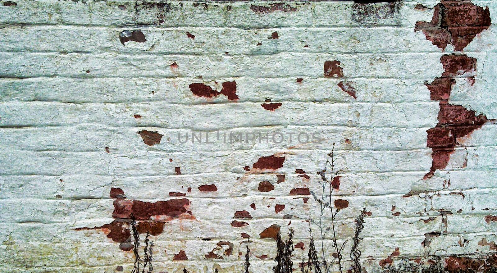 White old brick wall in need of repair