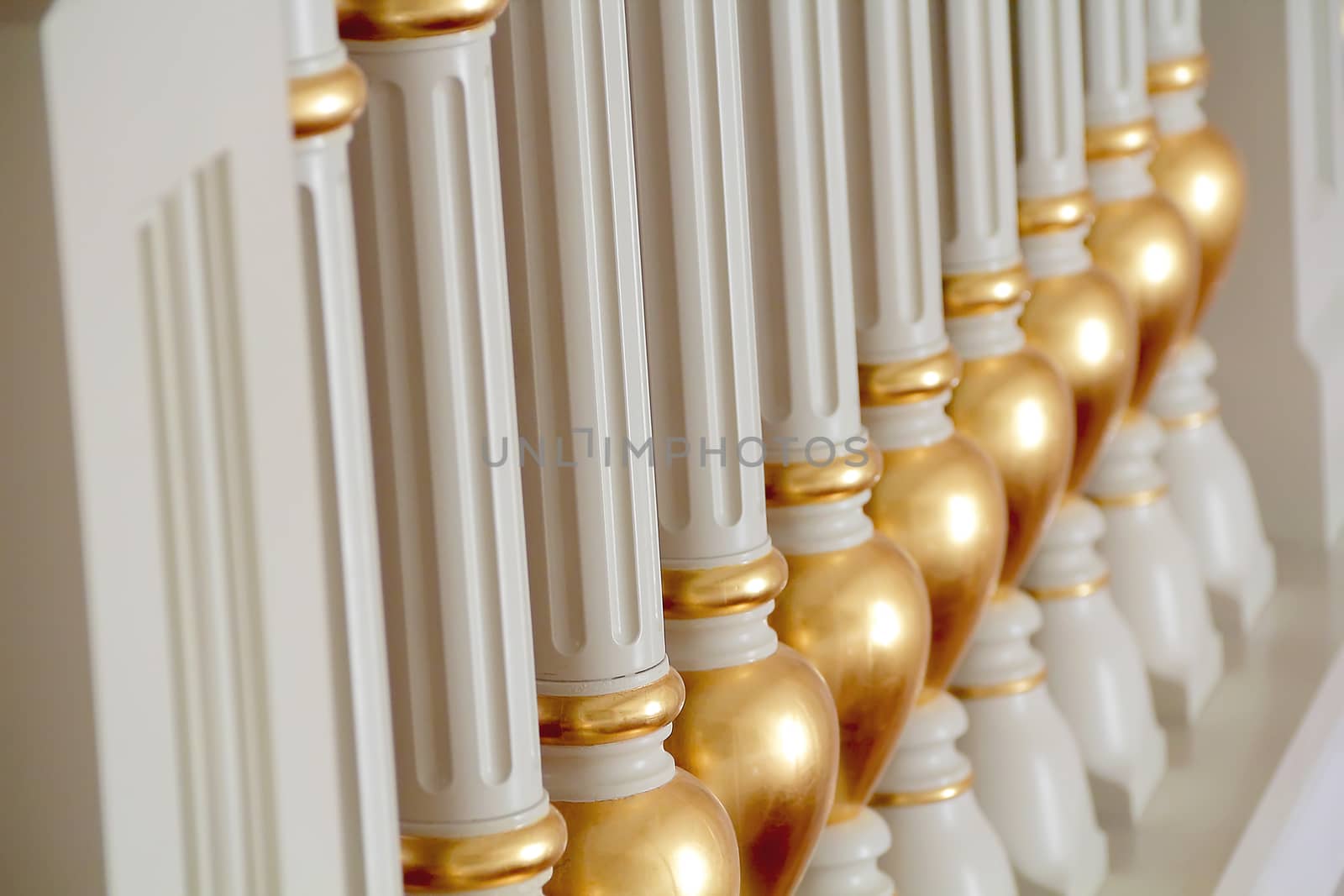 Image of white and gold balustrade pattern