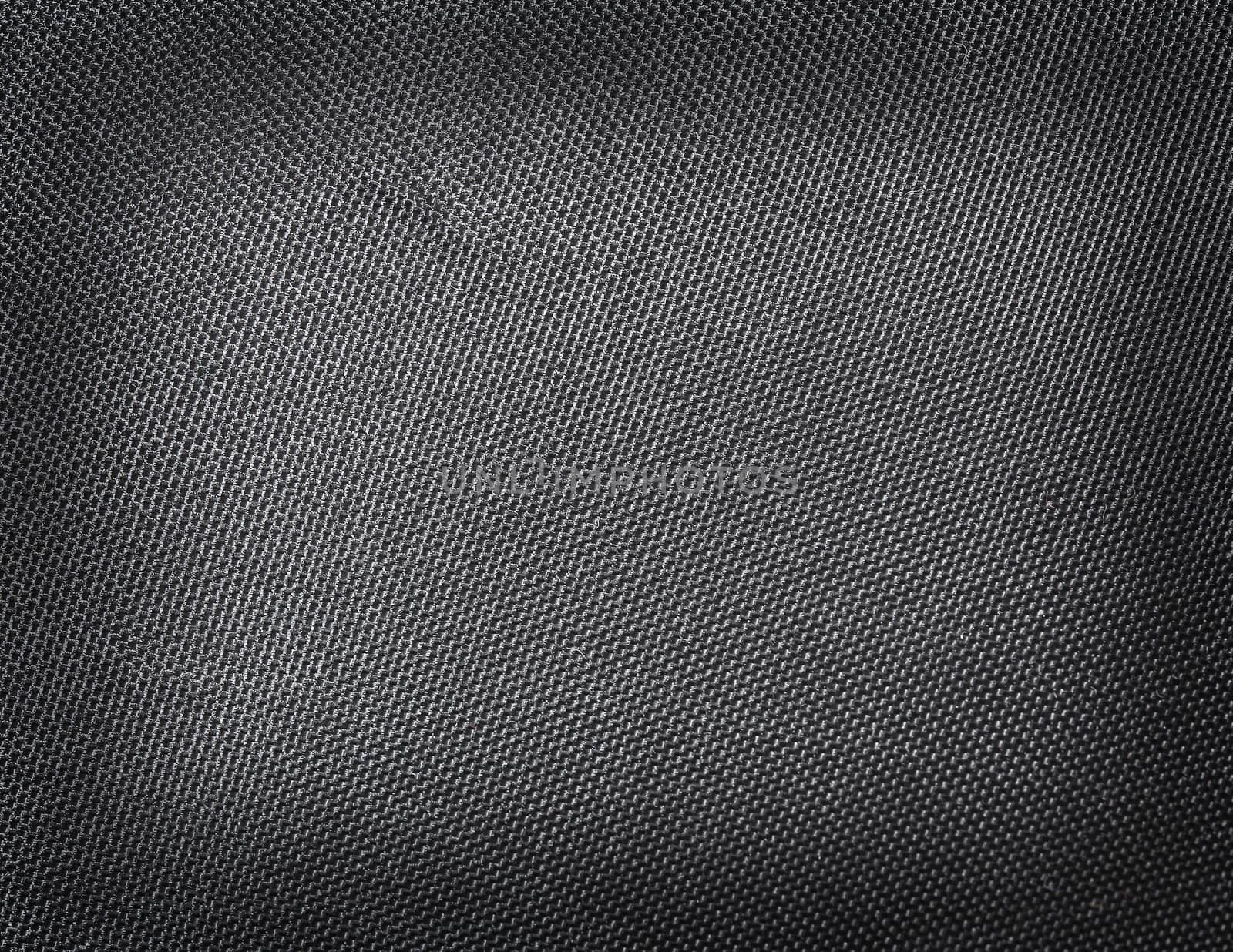 Black polyester texture background. Close up