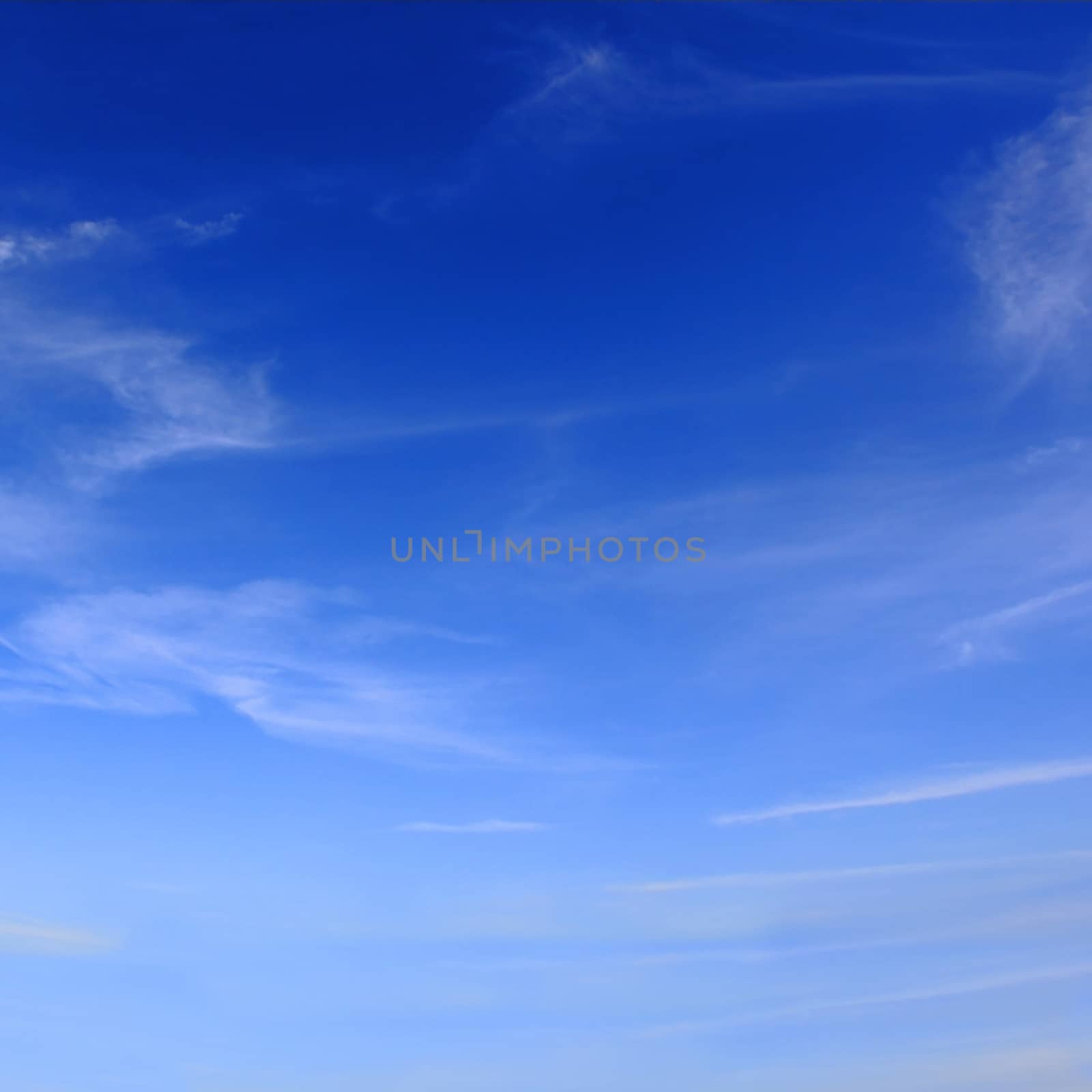 Image of the summer fluffy blue sky