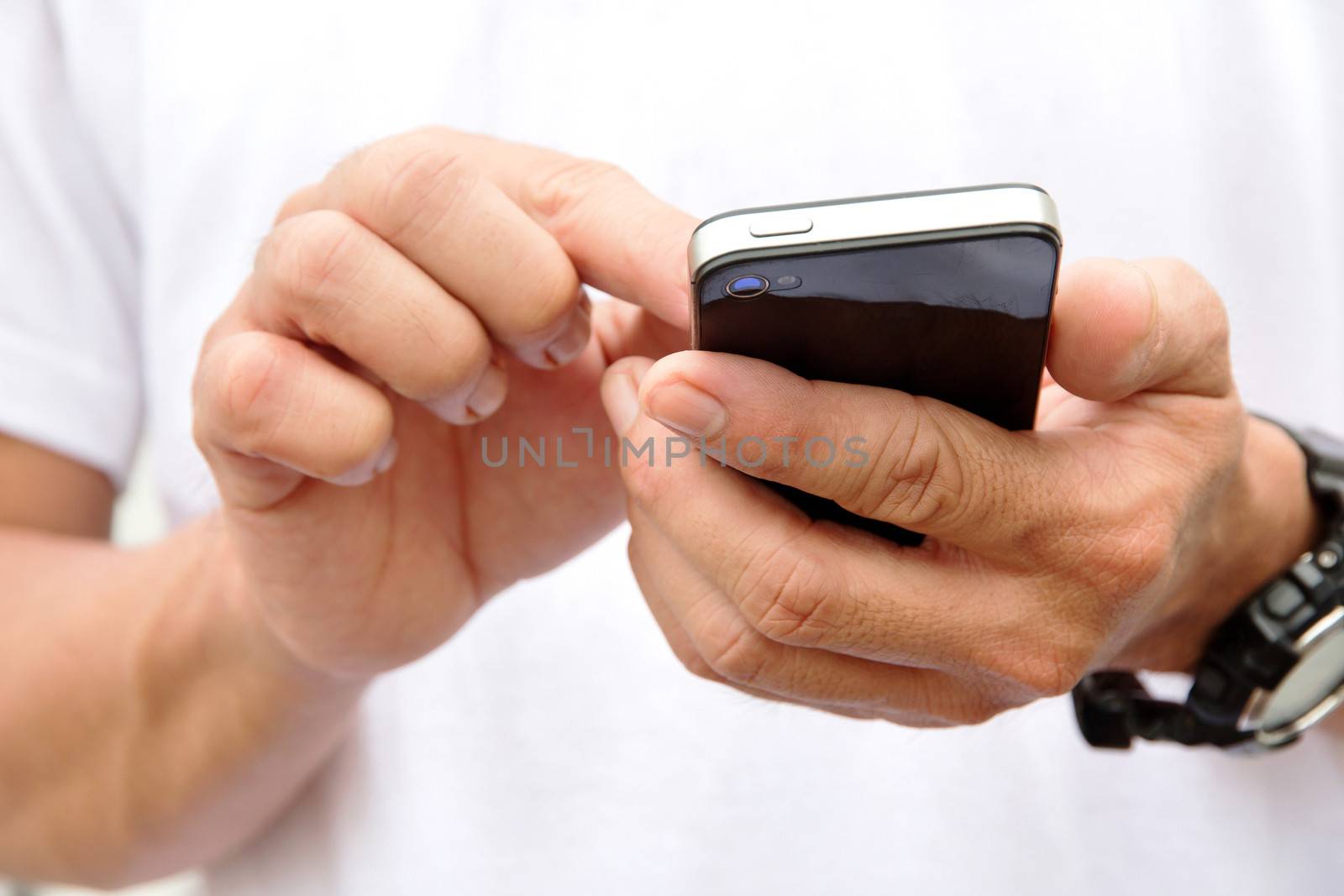 man checking his phone by ponsulak
