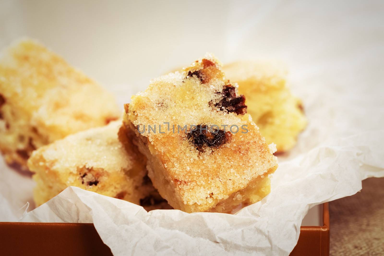 small traditional german christmas stollen pieces on parchment paper