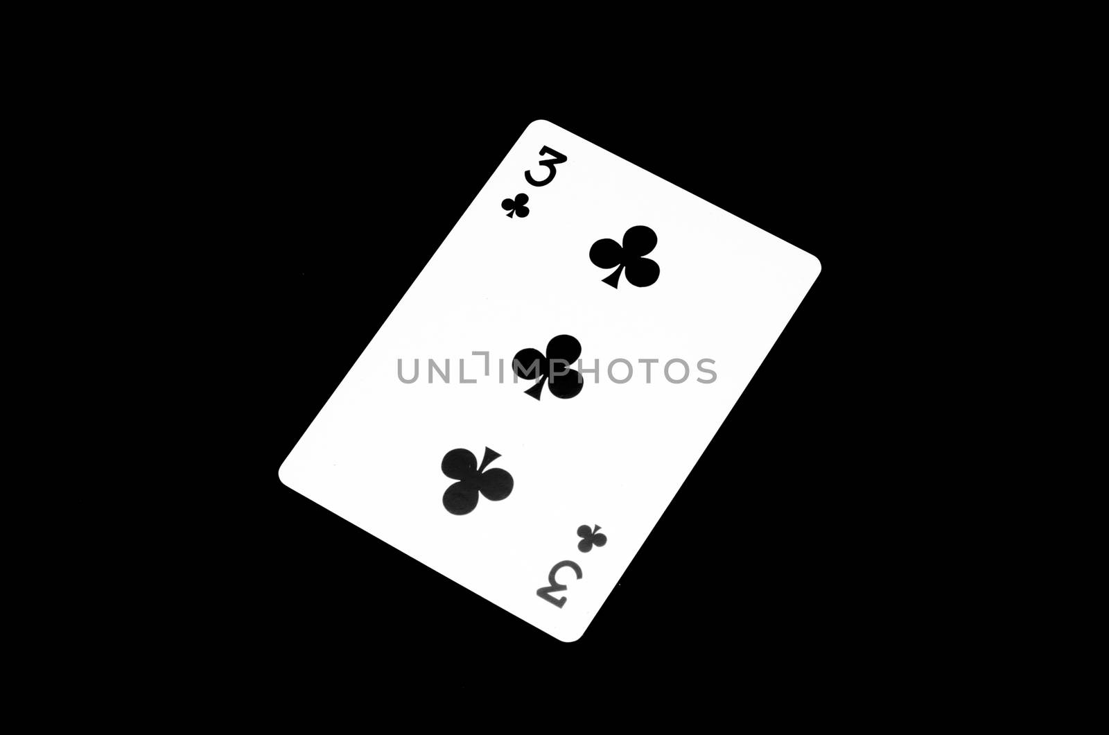 number three clover card isolated on black