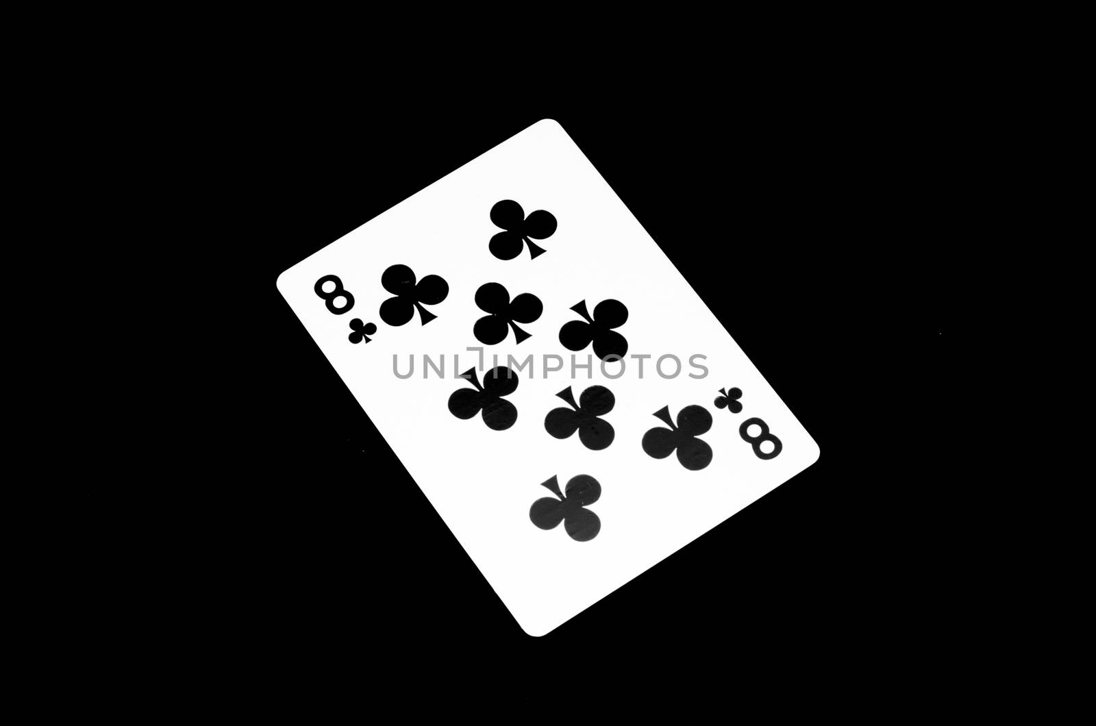 number eight clover card isolated on black background