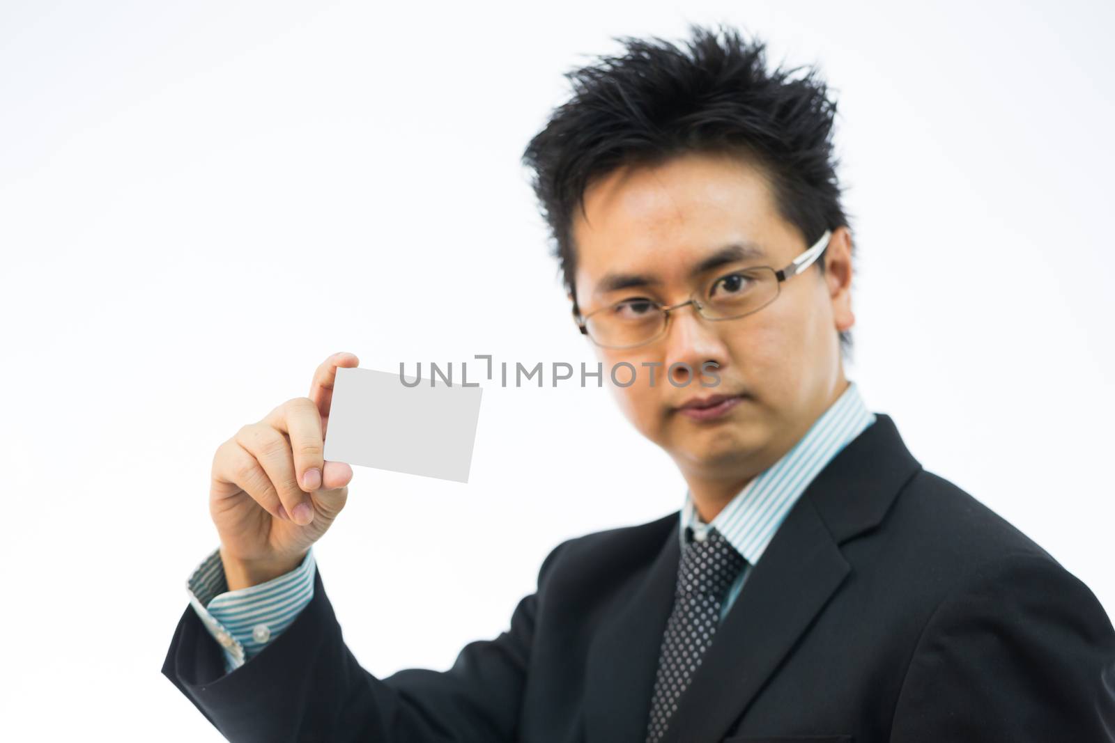 Businessman holding business name card isolated over white background