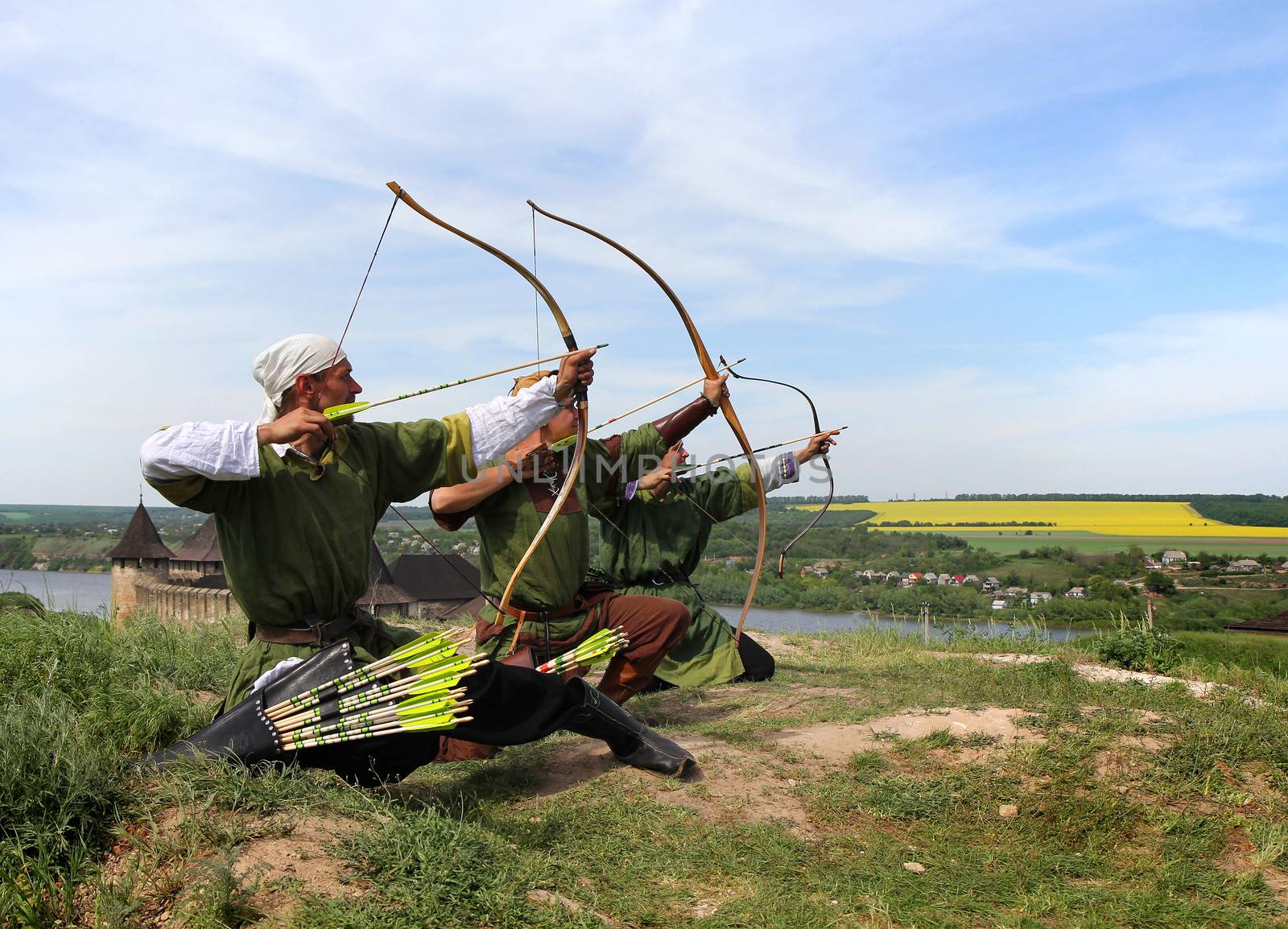 KHOTYN - MAY 10: Unidentified archers aiming during Festival Medieval Khotyn on May 10, 2013, Ukraine