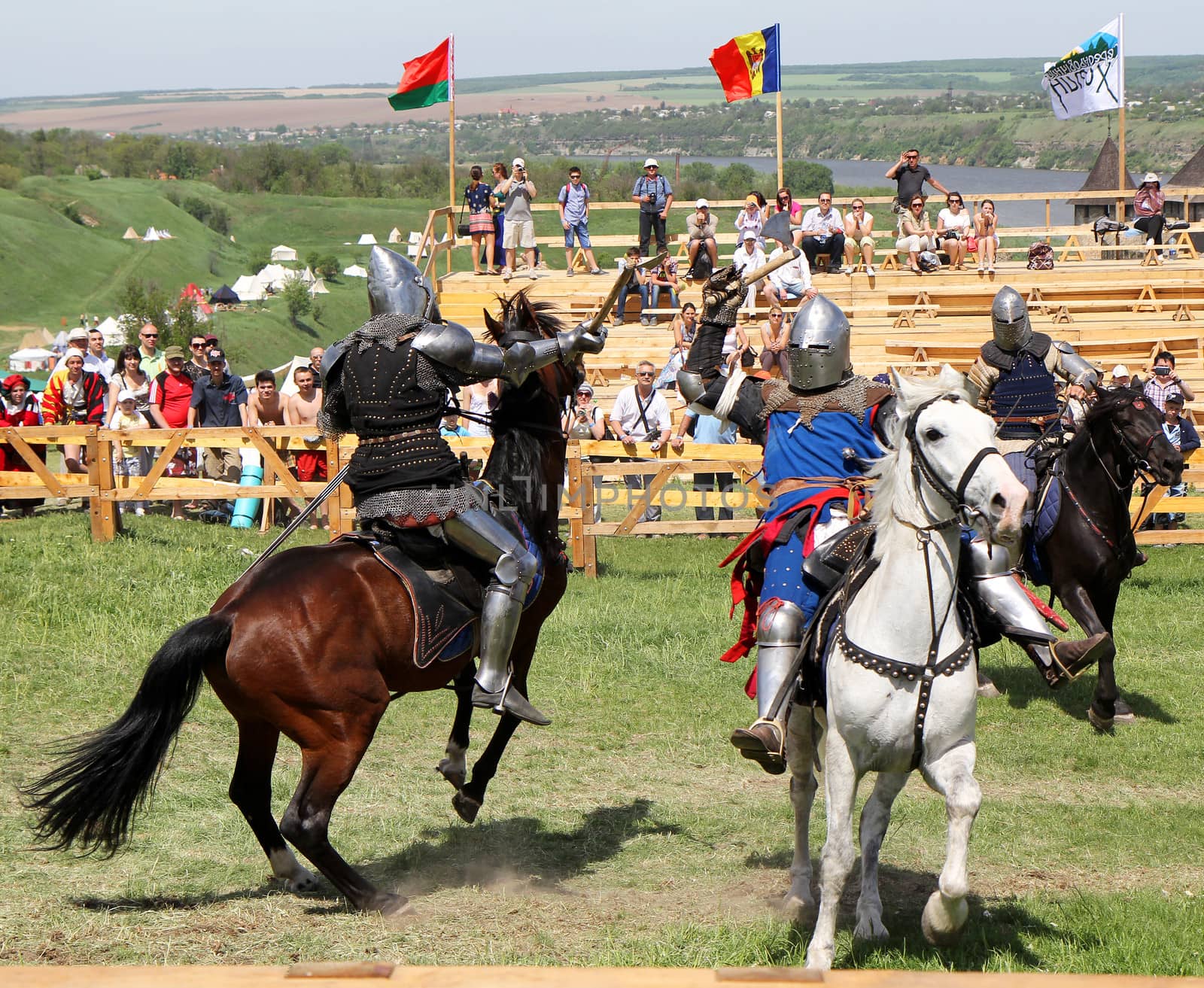 KHOTYN - MAY 10: Knights on horseback  fighting during Festival Medieval Khotyn on May 10, Ukraine