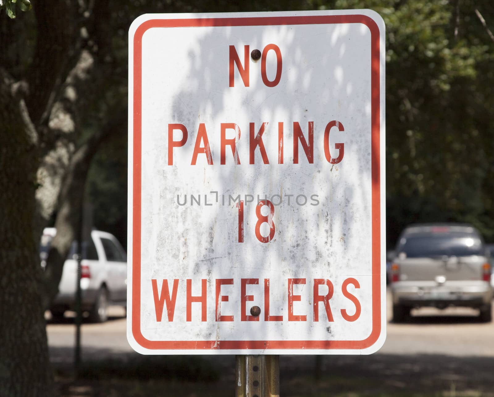 No parking 18 wheelers sign in shade
