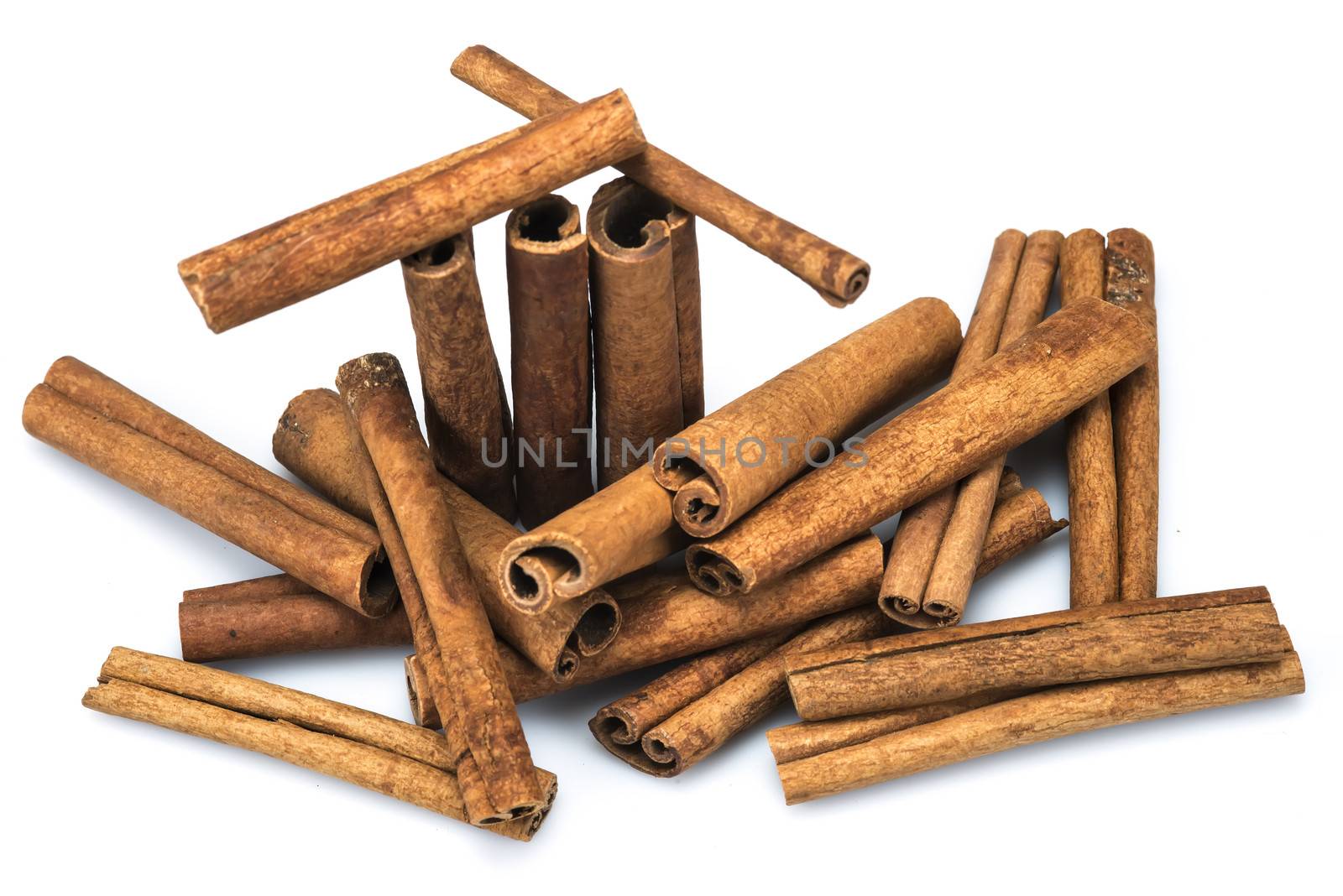 Cinnamon sticks isolated on a white background by angelsimon