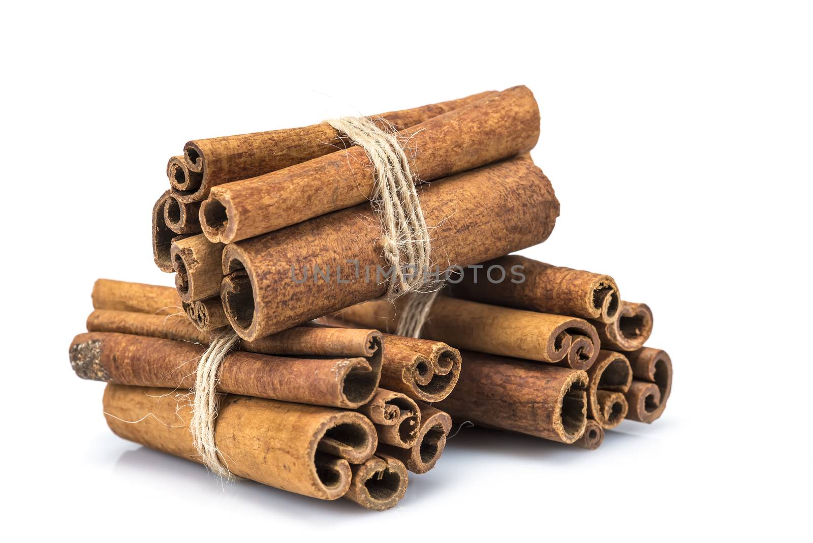 Bunches of cinnamon sticks by angelsimon