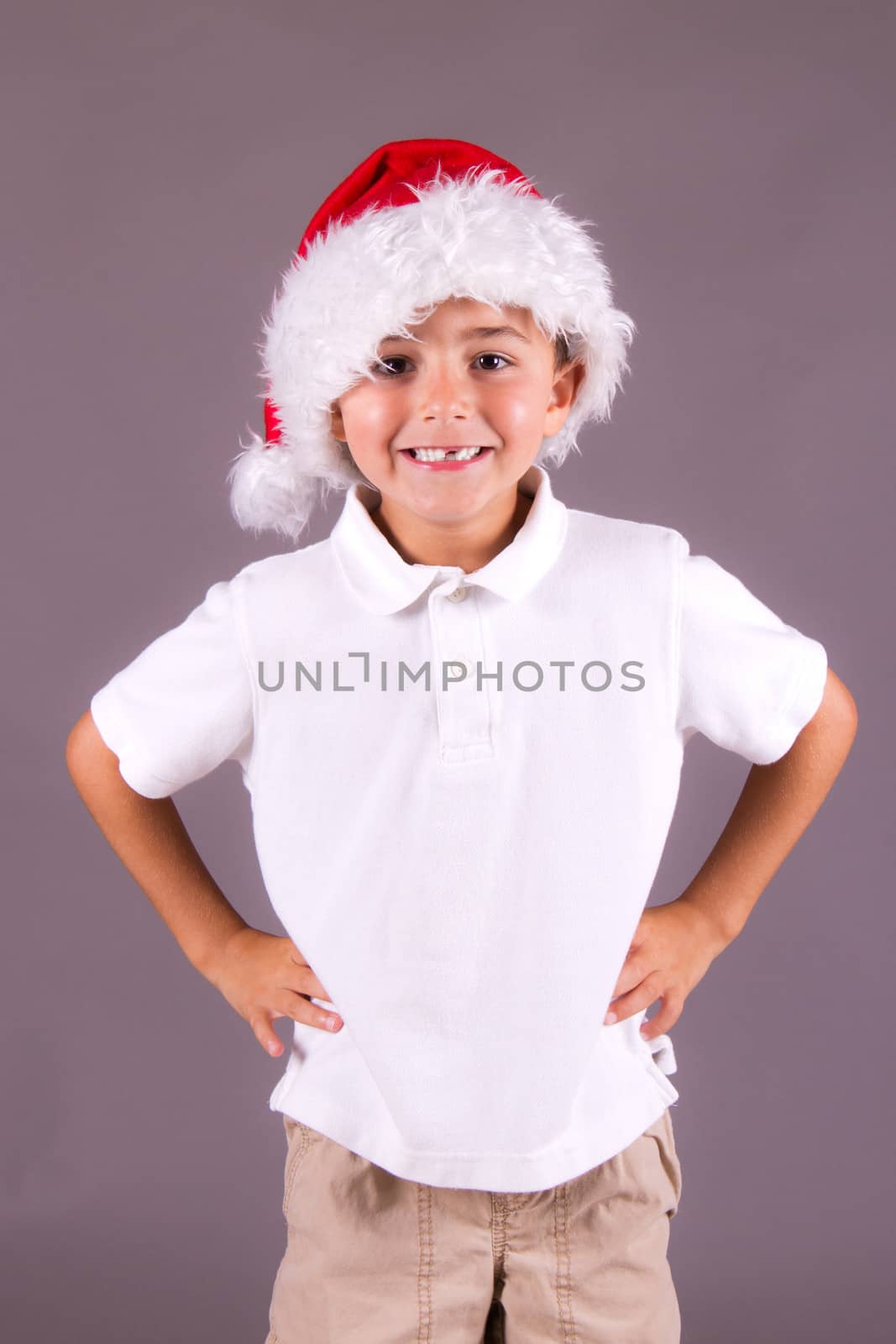 Happy boy with Santa hat