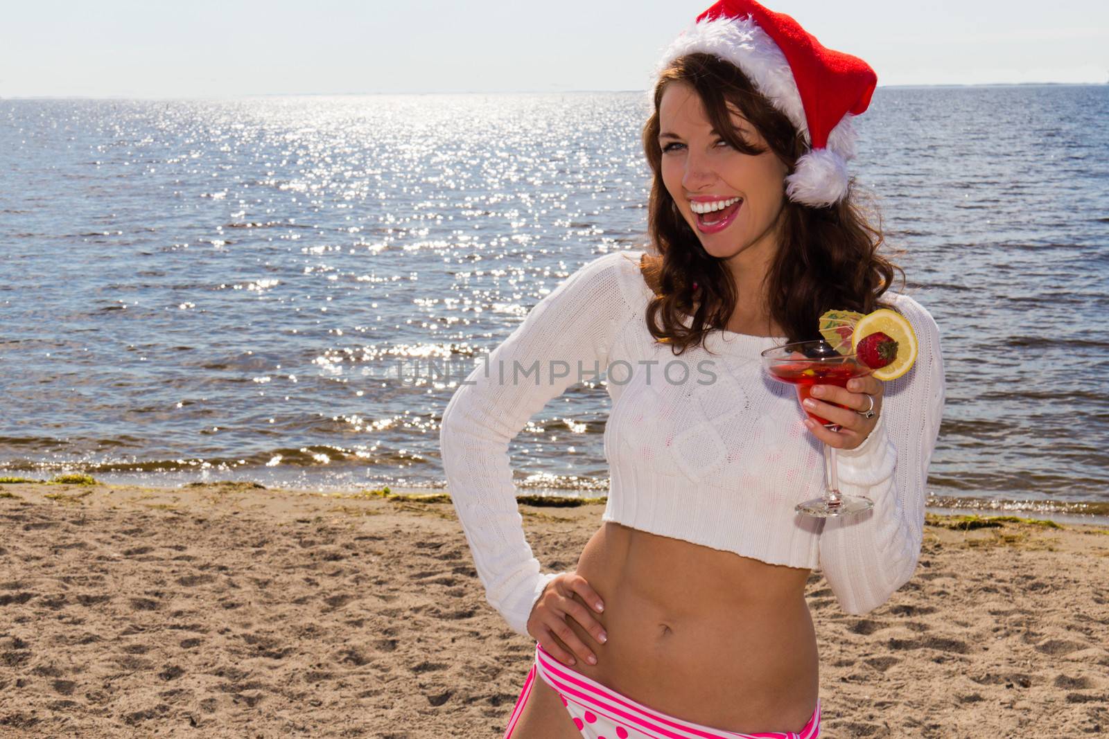 Woman with drink on the beach.  Christmas Vacation by bigjohn36