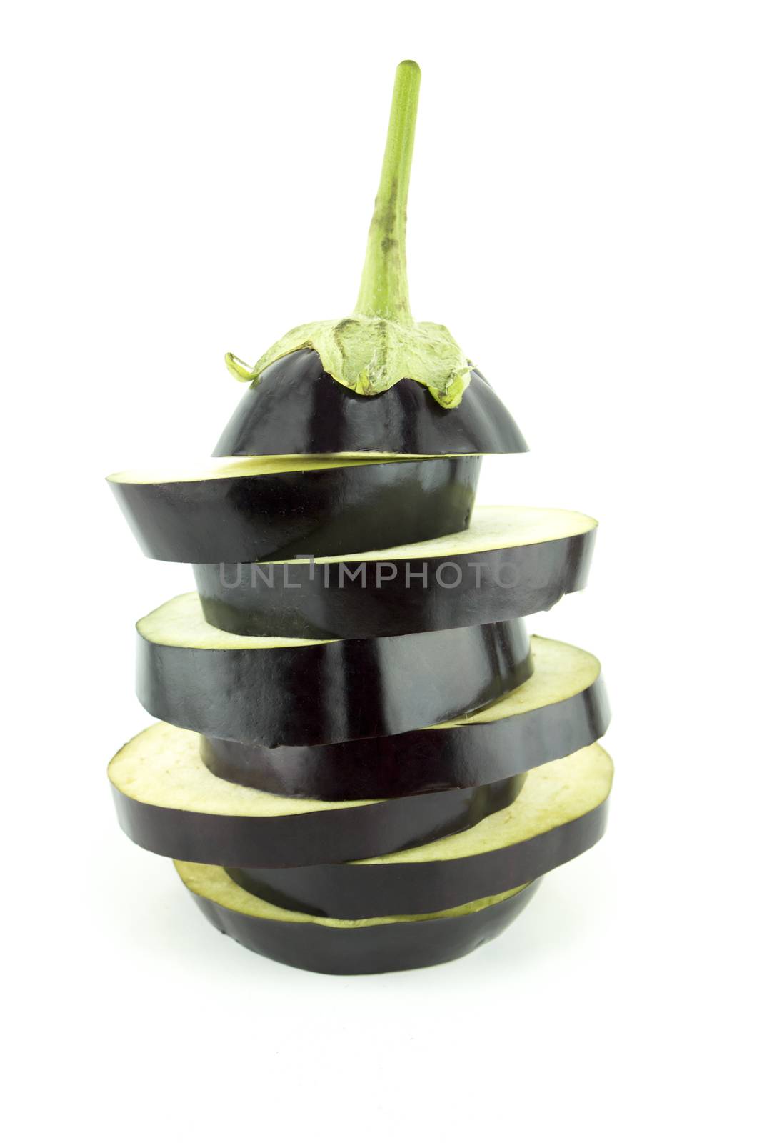 fresh eggplant sliced, aubergine vegetable on white background .