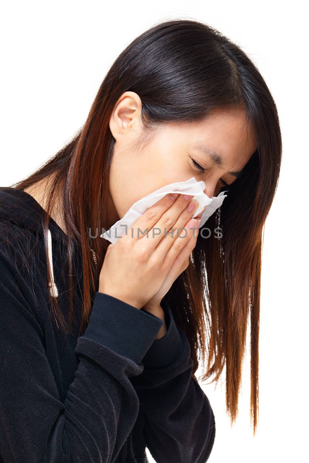 Sneezing asian woman