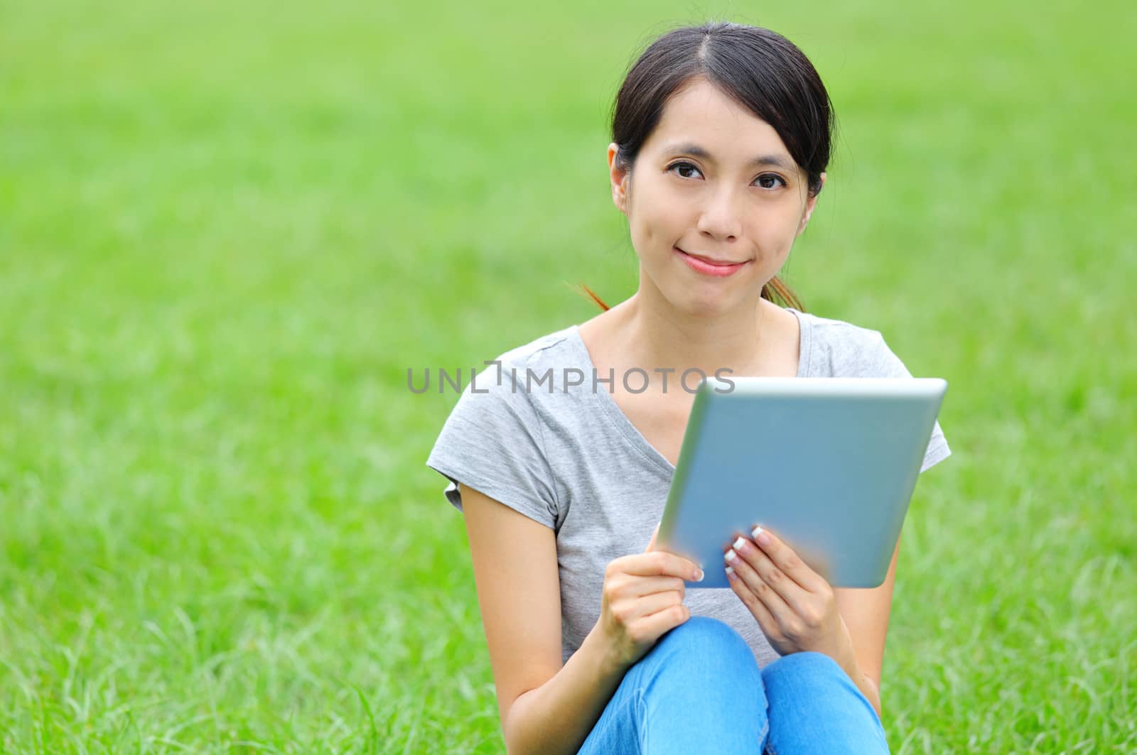Asian woman with digital tablet