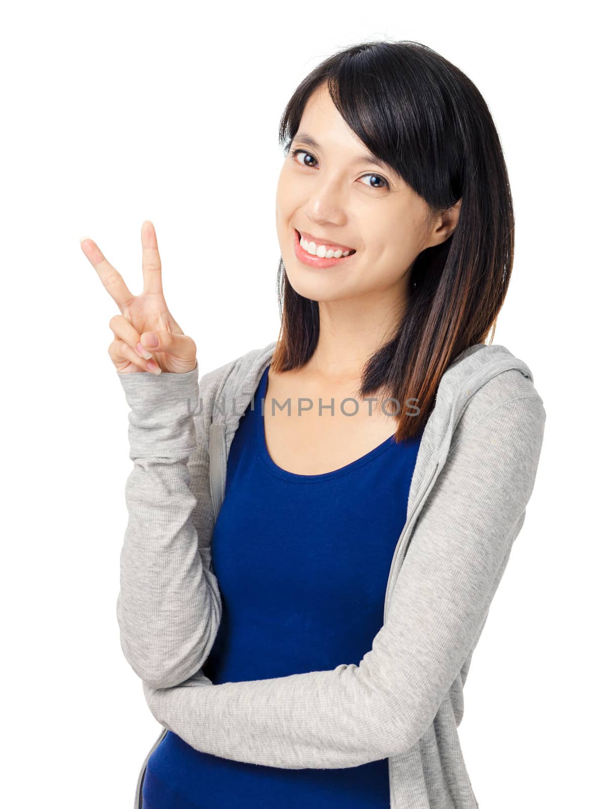 young girl show victory sign isolated on white background
