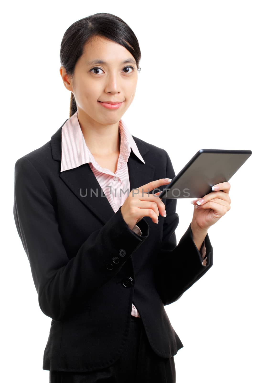 Asian business woman using tablet pc by leungchopan