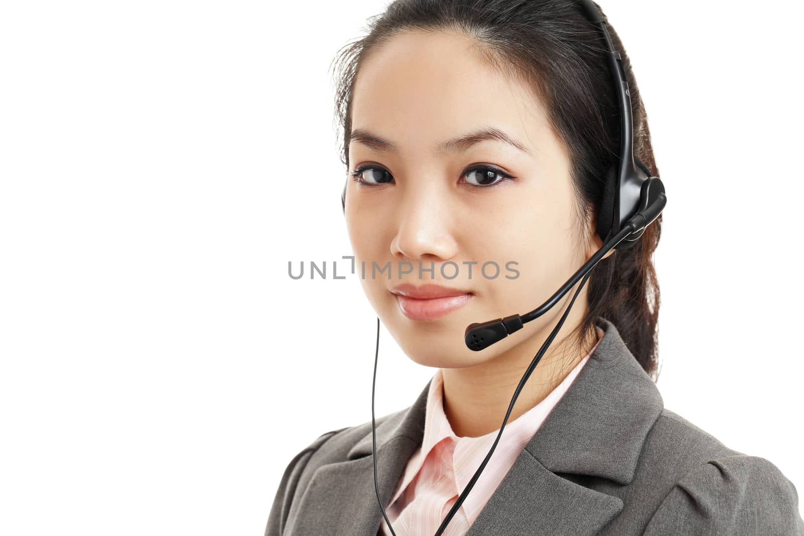 Asian business woman with headset by leungchopan