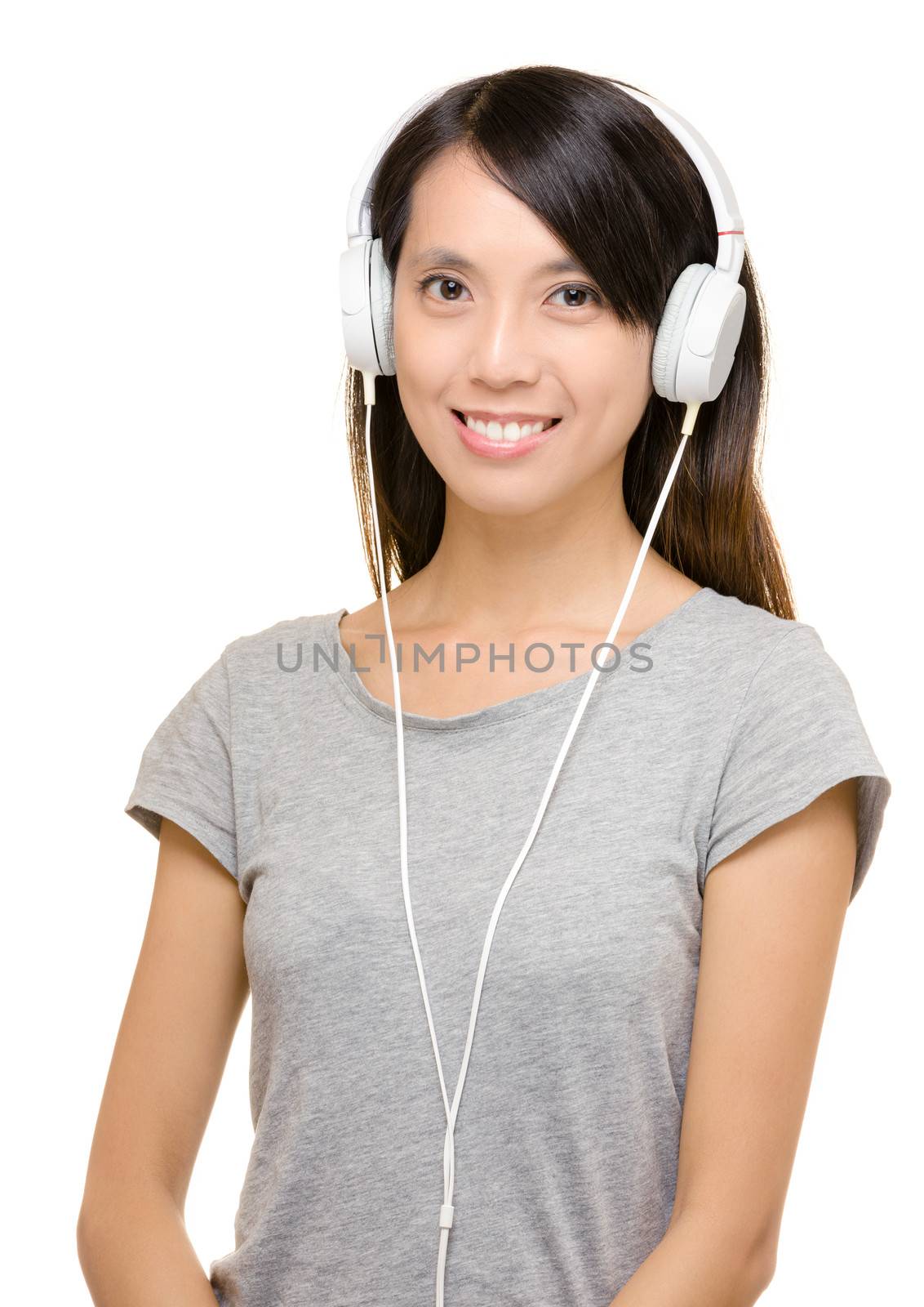 Asian woman using headphone by leungchopan
