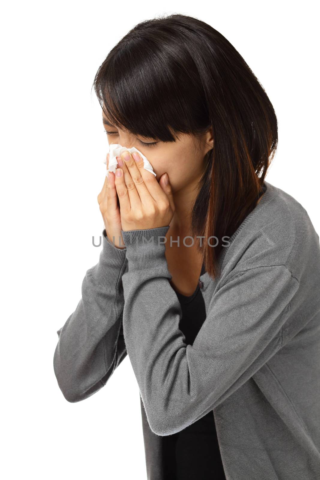 Cold sneezing asian woman