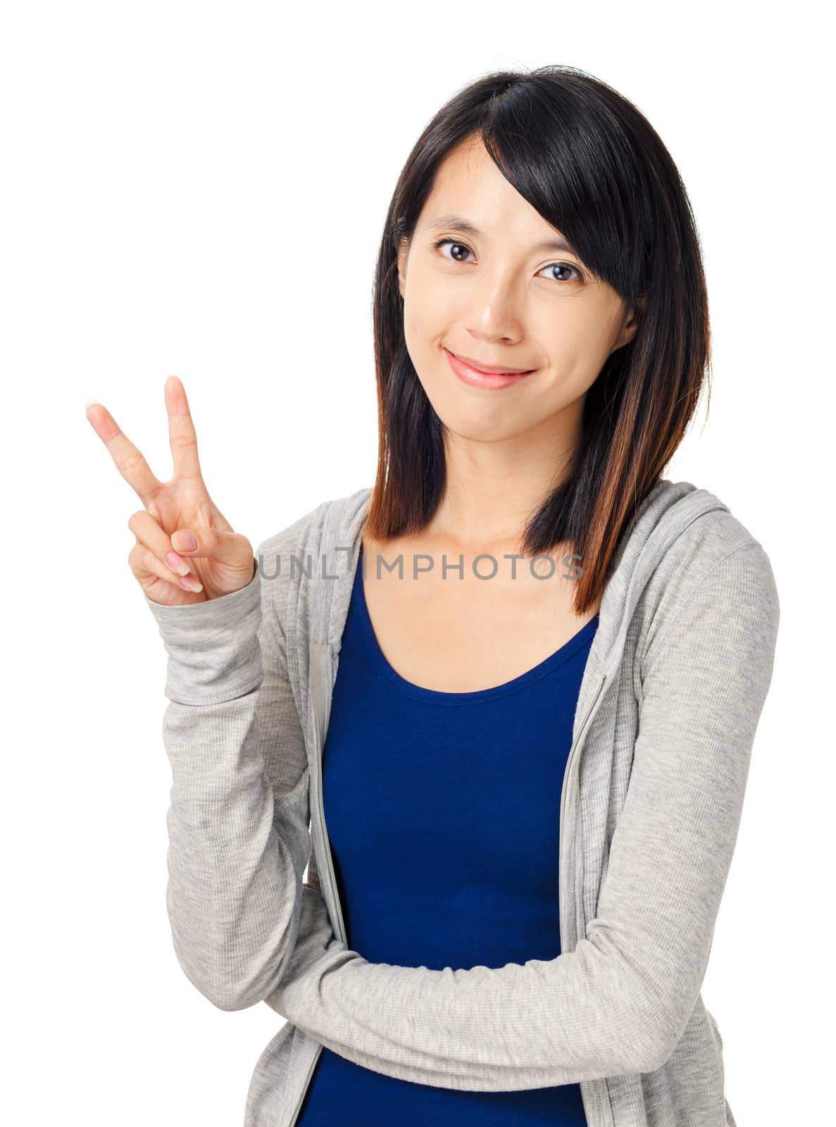 Asian girl show victory sign isolated on white background by leungchopan