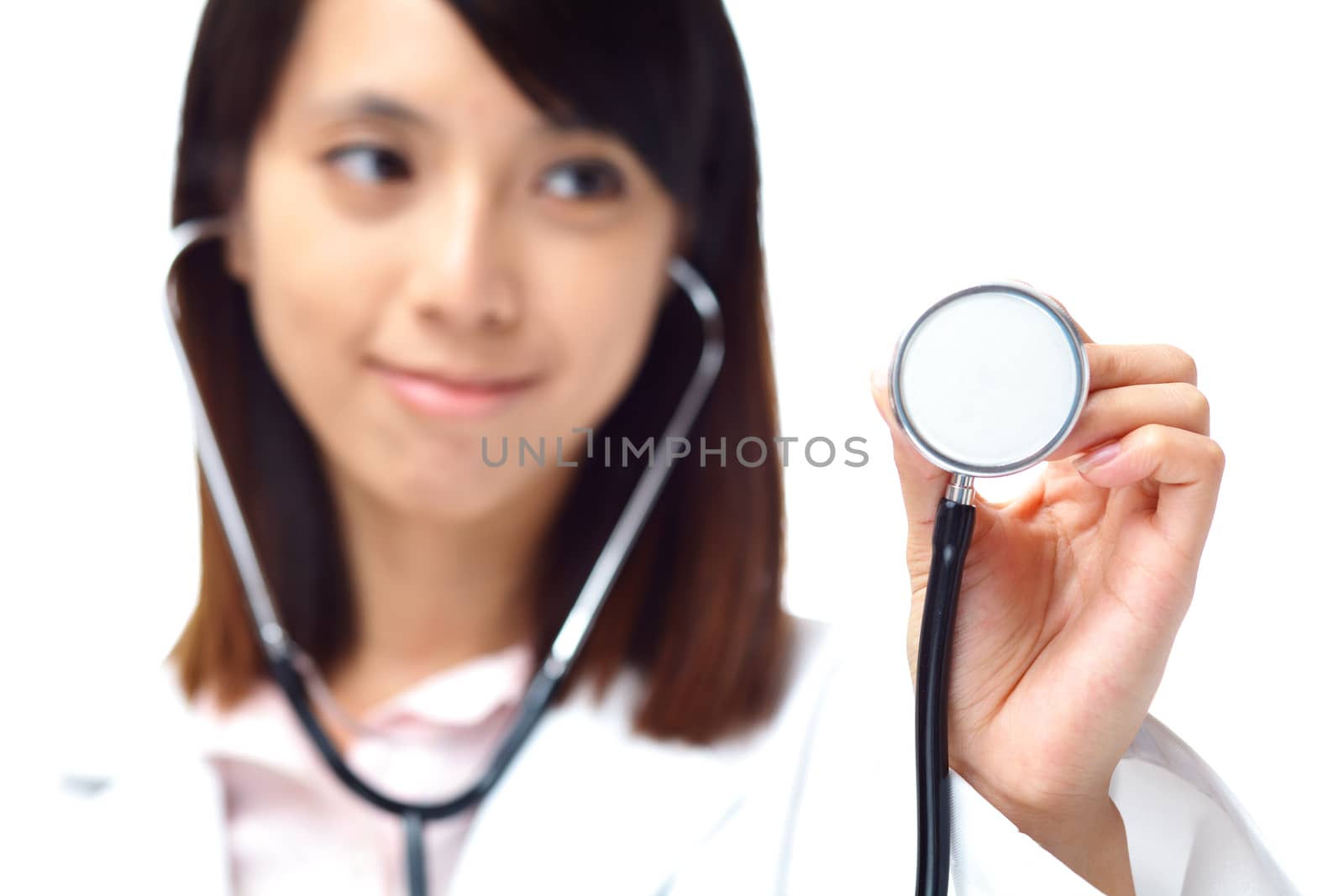 Asian female doctor holding stethoscope by leungchopan