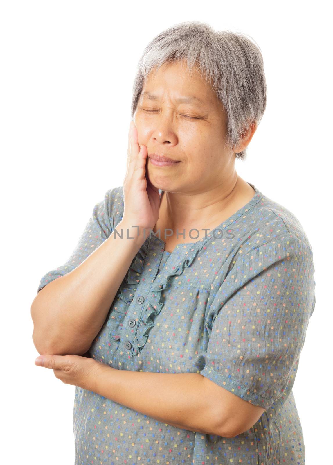 Asian old woman with toothache