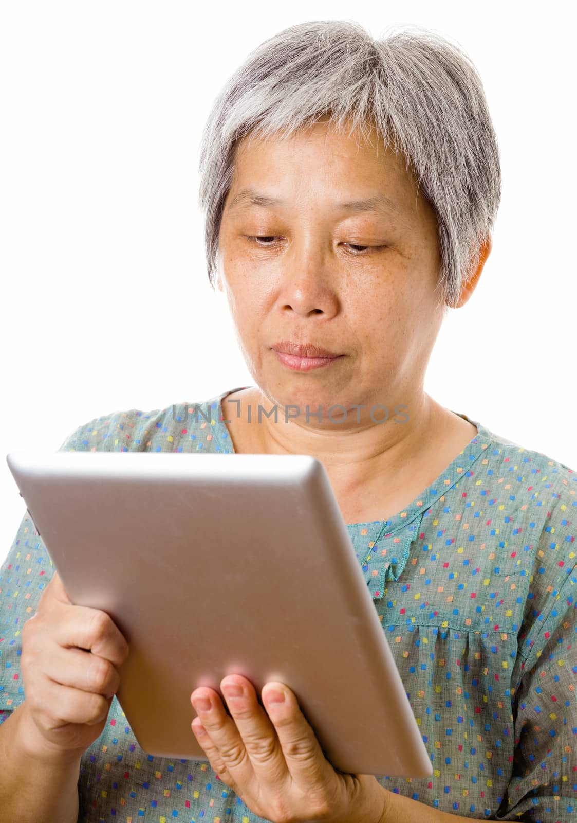 Asian elderly using tablet