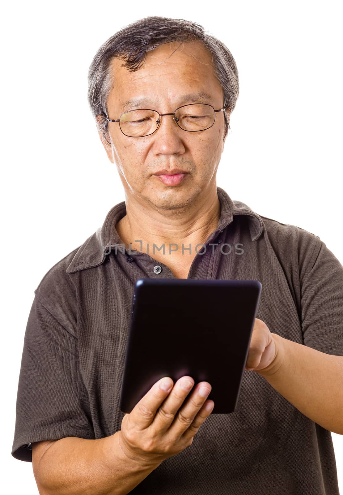 Asian old man using tablet