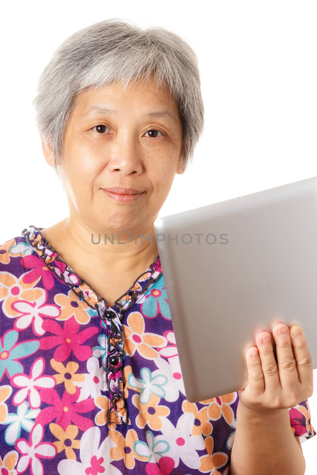 Asian old woman with digital tablet by leungchopan