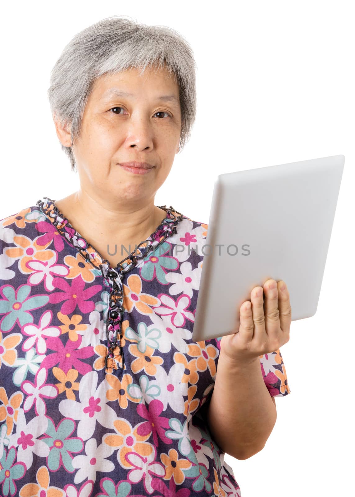 Asian old woman with digital tablet by leungchopan