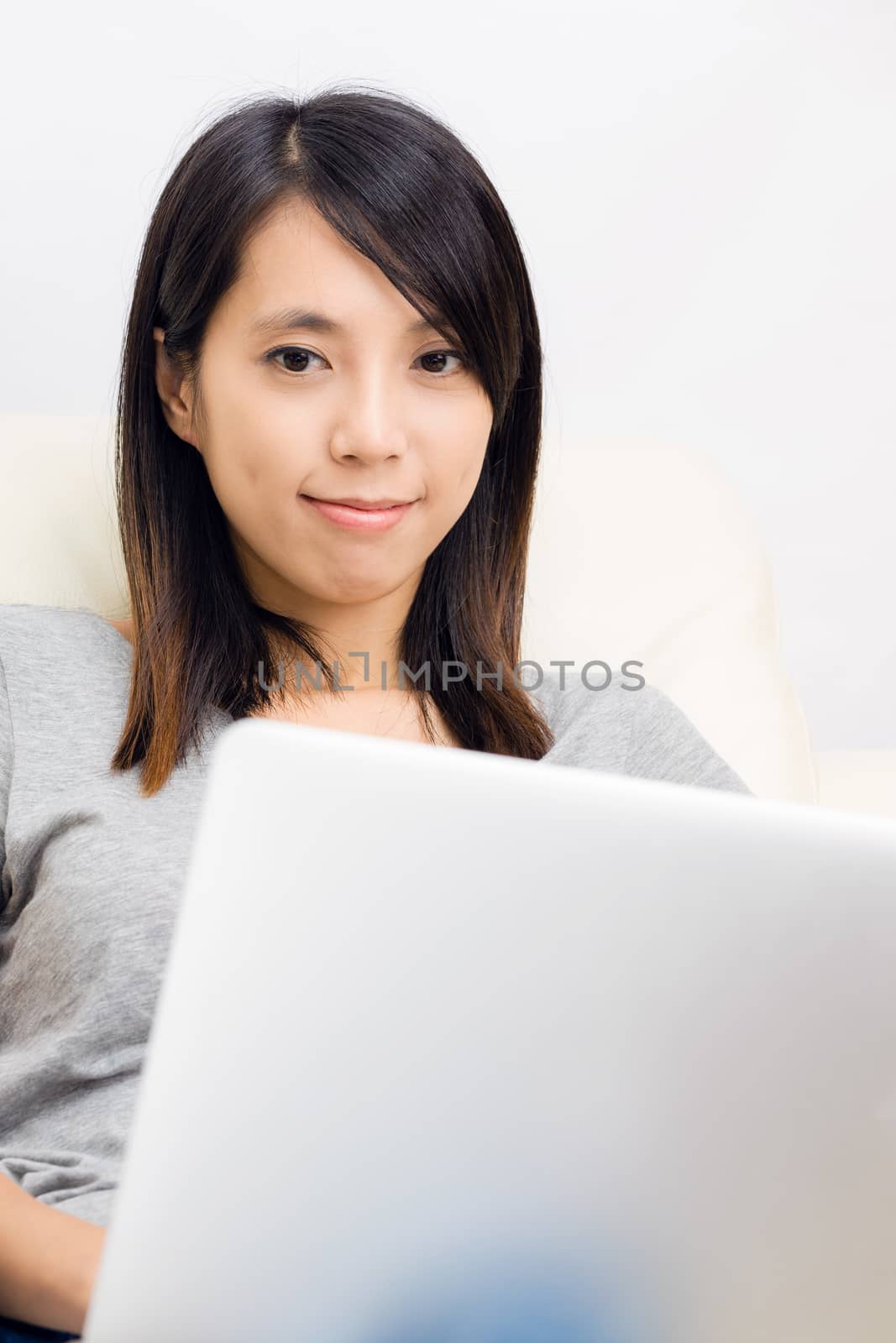 Asian woman using laptop