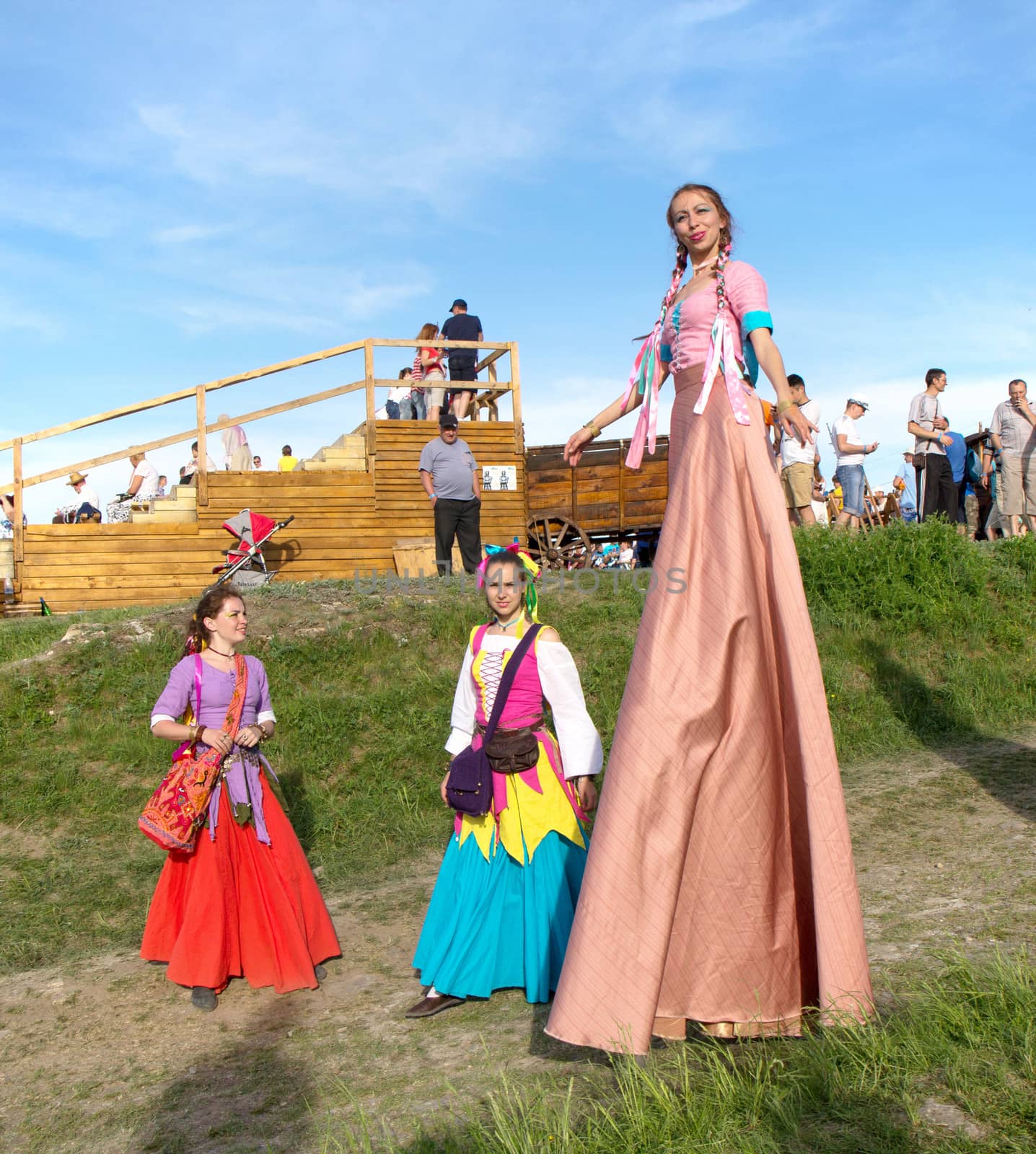 KHOTYN - MAY 10: Unidentified stilt girls during Festival Medieval Khotyn on May 10, Ukraine