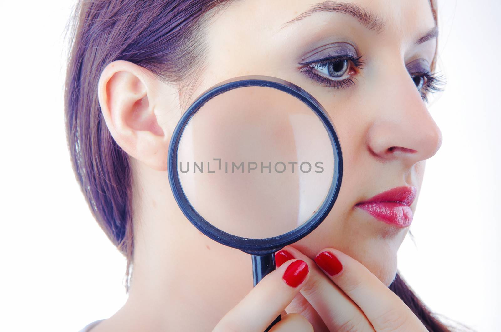 An image of Women with magnifying glass over her lips
