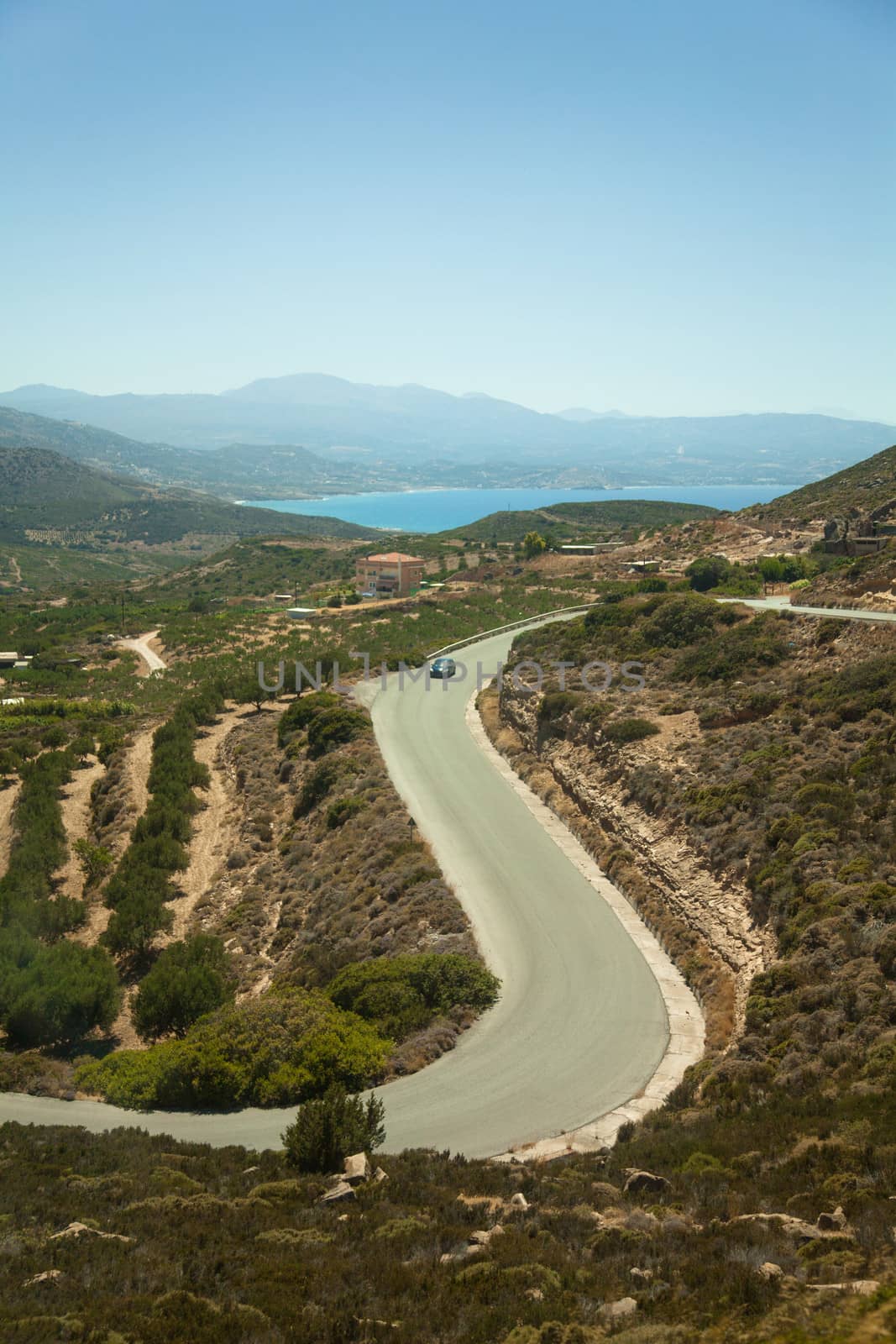 Serpentine road on island Crete, Greece, with sea view 