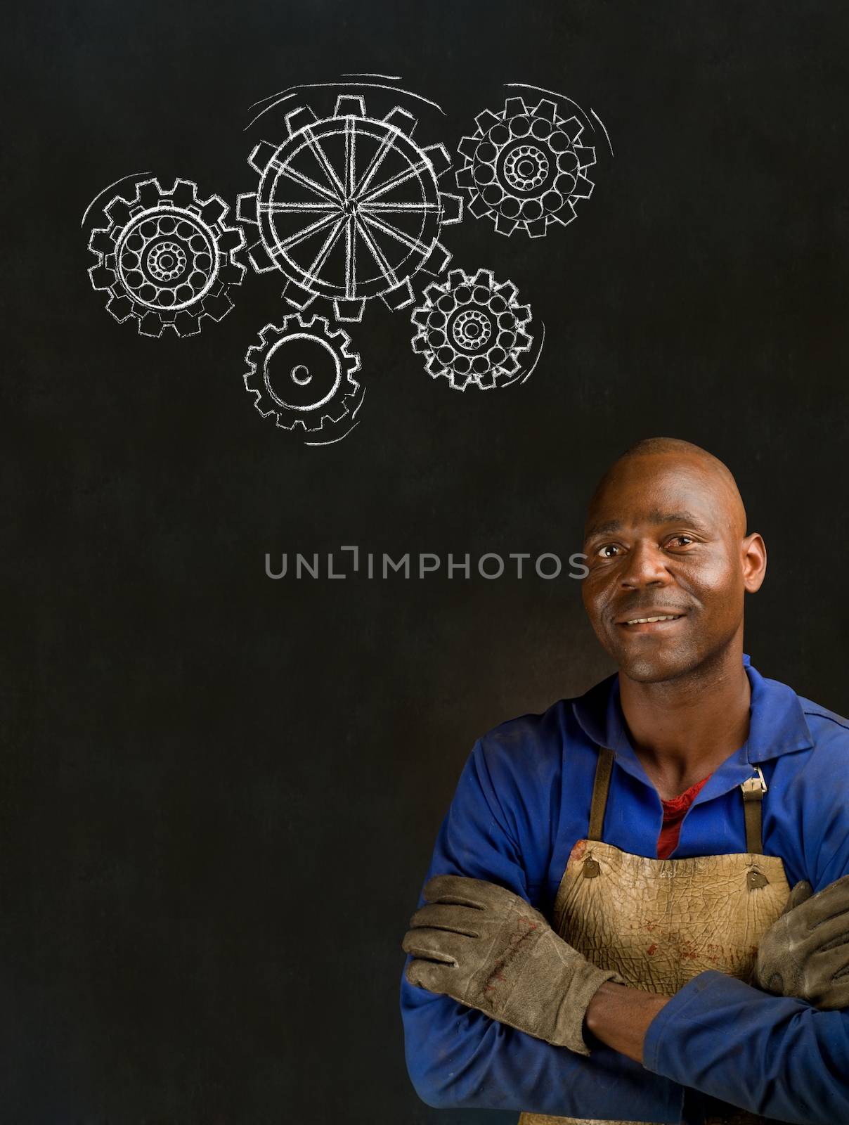 African American black man industrial worker with chalk gears on a blackboard background